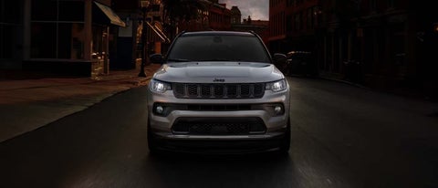 A woman with her hands full uses her foot to activate the available hands-free liftgate. | Bachrodt Baraboo Motors in Baraboo WI