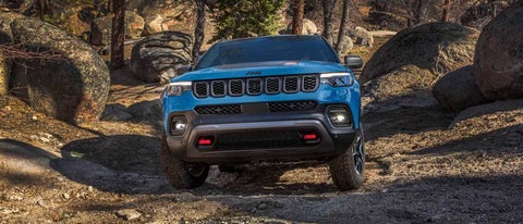 The 2026 Jeep Compass is parked on a city street. | Bachrodt Baraboo Motors in Baraboo WI